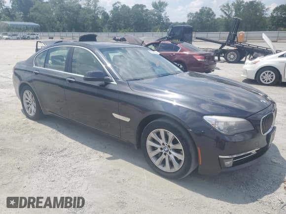 ✅ 2014 BMW 7 Series 740i • VIN: WBAYA6C58ED826649 • Lot: 66338525. Listed on Copart with 252,372 mi. Free auction sales archive from the USA and detailed vehicle history report at DreamBid. Image 4.