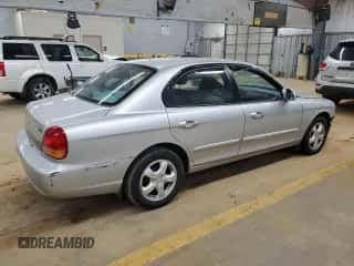 2000 Hyundai Sonata GL с VIN KMHWF25S2YA301983, выставлен на аукционе Copart как лот 86840554 с пробегом 104 780 миль миль и Списание • Salvage title. История ставок и продаж доступна на DreamBid. Изображение 3.