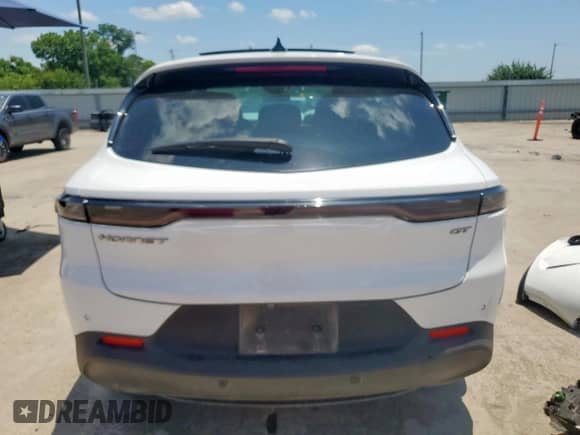 2024 Dodge Hornet GT z VIN ZACNDFAN1R3A39055, wystawiony jako Copart lot #61195985 z przebiegiem 8 934 mil mil oraz Czysty tytuł • Clean title. Historia ofert i sprzedaży dostępna na DreamBid. Obrazek 6.