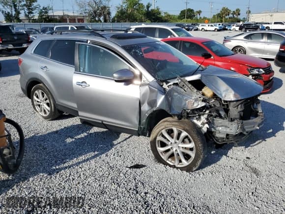 ✅ 2011 Mazda CX-9 Grand Touring • VIN: JM3TB2DA7B0321677 • Lot: 54860175. Wystawiony na Copart z przebiegiem 148 956 mil. Bezpłatny archiwum sprzedaży aukcyjnych z USA i szczegółowy raport historii pojazdu na DreamBid. Zdjęcie 4.