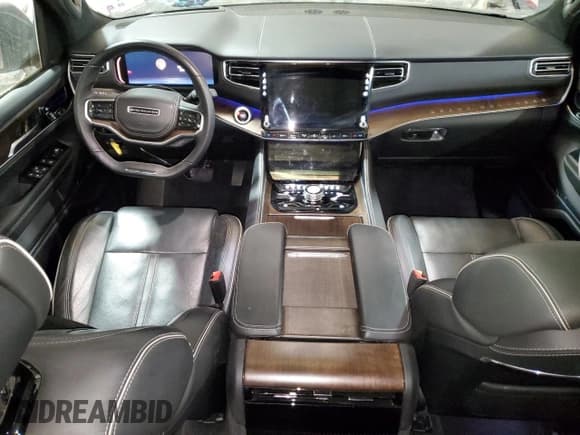 ✅ 2023 Jeep Grand Wagoneer Series II • VIN: 1C4SJSFP9PS529810 • Лот: 79950724. Опубликован ранее на Copart с пробегом 29 030 миль. Бесплатный доступ к архиву аукционных продаж из США и подробный отчёт об истории автомобиля на DreamBid. Изображение 8.