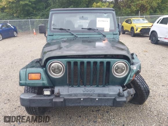 ✅ 2000 Jeep Wrangler Sahara • VIN: 1J4FA59S5YP700649 • Лот: 43291151. Опубликован ранее на IAAI с пробегом 183 974 миль. Бесплатный доступ к архиву аукционных продаж из США и подробный отчёт об истории автомобиля на DreamBid. Изображение 13.