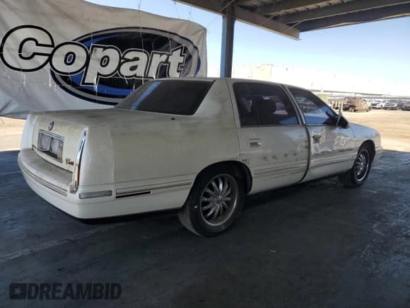 ✅ 1998 Cadillac DeVille • VIN: 1G6KF5496WU745580 • Lot: 69912165. Listed on Copart with 119,649 mi. Free auction sales archive from the USA and detailed vehicle history report at DreamBid. Image 3.