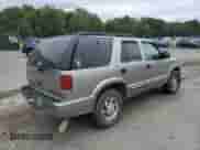 2001 Chevrolet Blazer LT с VIN 1GNDT13W812158646, выставлен на аукционе Copart как лот 73664804 с пробегом 182 735 миль миль и Списание • Salvage title. История ставок и продаж доступна на DreamBid. Изображение 3.
