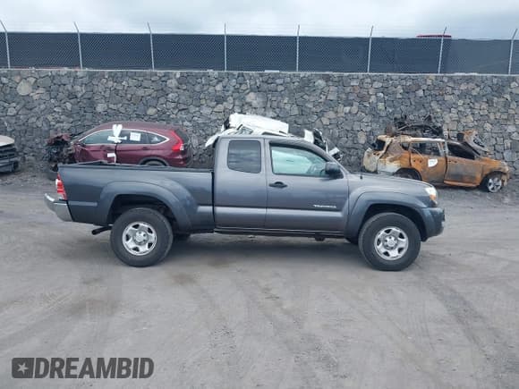 ✅ 2011 Toyota Tacoma • VIN: 5TFUU4EN8BX009220 • Lot: 43703304. Listed on IAAI with 126,142 mi. Free auction sales archive from the USA and detailed vehicle history report at DreamBid. Image 13.