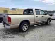 2004 Dodge 1500 SLT z VIN 1D7HA18D14S784671, wystawiony jako Copart lot #69988264 z przebiegiem 121 240 mil mil oraz Szkoda całkowita • Salvage title. Historia ofert i sprzedaży dostępna na DreamBid. Obrazek 3.
