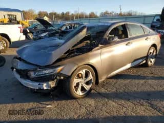 2018 Honda Accord EX-L z VIN 1HGCV1F5XJA140710, wystawiony jako Copart lot #89456795 z przebiegiem Nie podano mil oraz Szkoda całkowita • Salvage title. Historia ofert i sprzedaży dostępna na DreamBid. Obrazek 1.