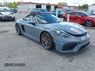 ✅ 2023 Porsche 718 Spyder • VIN: WP0CC2A85PS222391 • Lot: 43208392. Wystawiony na IAAI z przebiegiem 13 616 mil. Bezpłatny archiwum sprzedaży aukcyjnych z USA i szczegółowy raport historii pojazdu na DreamBid. Zdjęcie 1.