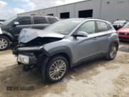 ✅ 2018 Hyundai Kona SEL • VIN: KM8K62AA0JU101040 • Лот: 39777074. Опубликован ранее на Copart с пробегом 186 018 миль. Бесплатный доступ к архиву аукционных продаж из США и подробный отчёт об истории автомобиля на DreamBid. Изображение 1.