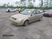 ✅ 2004 Suzuki Forenza S • VIN: KL5JD52Z24K995110 • Lot: 41909662. Listed on IAAI with 110,274 mi. Free auction sales archive from the USA and detailed vehicle history report at DreamBid. Image 2.