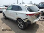 ✅ 2015 Lincoln MKC • VIN: 5LMTJ2AH1FUJ32057 • Lot: 42495924. Listed on IAAI with 82,125 mi. Free auction sales archive from the USA and detailed vehicle history report at DreamBid. Image 3.