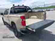 2022 Chevrolet Silverado 1500 Custom Trail Boss with VIN 3GCPDCEDXNG569831, listed as a IAAI auction lot 42241829 with 11,734 mi miles and . Bid and sale history available at DreamBid. Image 3.