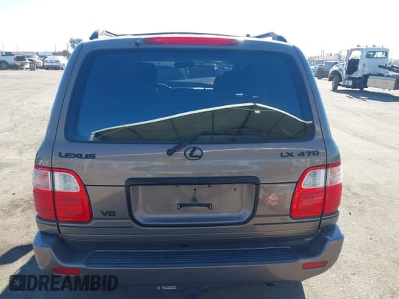 ✅ 1999 Lexus LX 470 • VIN: JT6HT00W5X0075986 • Lot: 41228035. Listed on IAAI with 163,548 mi. Free auction sales archive from the USA and detailed vehicle history report at DreamBid. Image 16.