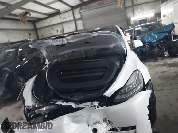 ✅ 2023 Tesla Model Y Long Range • VIN: 7SAYGDEE7PF596216 • Lot: 41557542. Listed on IAAI with 95,065 mi. Free auction sales archive from the USA and detailed vehicle history report at DreamBid. Image 11.