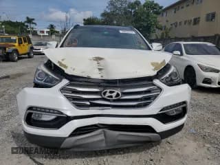 ✅ 2018 Hyundai Santa Fe 2.4L • VIN: 5NMZUDLB4JH104458 • Лот: 70008413. Опубликован ранее на Copart с пробегом 56 961 миль. Бесплатный доступ к архиву аукционных продаж из США и подробный отчёт об истории автомобиля на DreamBid. Изображение 5.