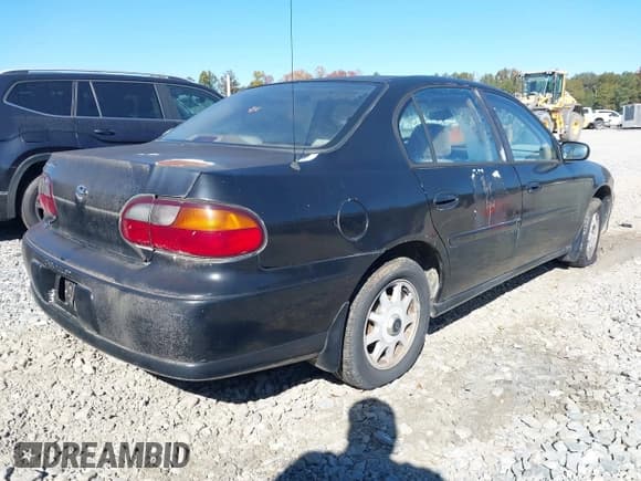 ✅ 1999 Chevrolet Malibu • VIN: 1G1ND52M5X6131934 • Lot: 43670531. Listed on IAAI with 154,686 mi. Free auction sales archive from the USA and detailed vehicle history report at DreamBid. Image 4.