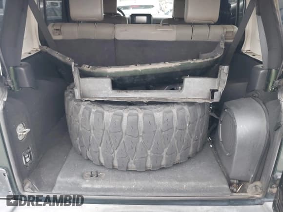 ✅ 2007 Jeep Wrangler Unlimited Sahara • VIN: 1J4GA59147L218594 • Lot: 42984397. Listed on IAAI with 108,296 mi. Free auction sales archive from the USA and detailed vehicle history report at DreamBid. Image 12.