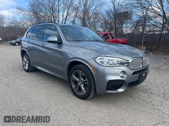 ✅ 2015 BMW X5 xDrive50i • VIN: 5UXKR6C50F0J76918 • Lot: 48632265. Listed on Copart with 141,000 mi. Free auction sales archive from the USA and detailed vehicle history report at DreamBid. Image 1.