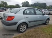 ✅ 2007 Kia Rio LX • VIN: KNADE123376211942 • Lot: 75014014. Listed on Copart with 116,651 mi. Free auction sales archive from the USA and detailed vehicle history report at DreamBid. Image 3.