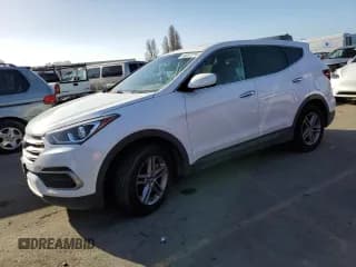 ✅ 2018 Hyundai Santa Fe 2.4L • VIN: 5NMZT3LB3JH070610 • Лот: 40257714. Опубликован ранее на Copart с пробегом 130 044 миль. Бесплатный доступ к архиву аукционных продаж из США и подробный отчёт об истории автомобиля на DreamBid. Изображение 1.