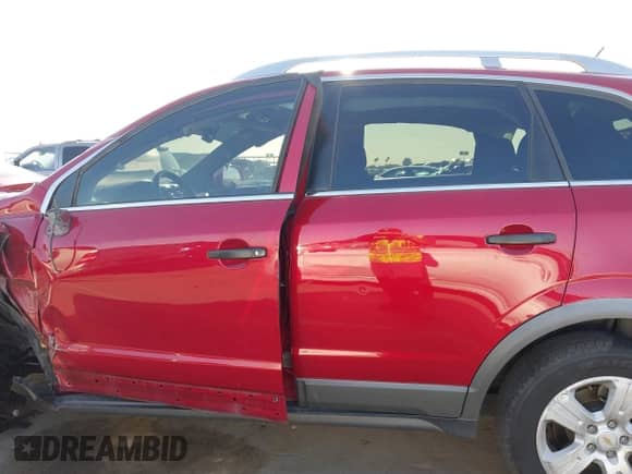 2015 Chevrolet Captiva Sport LS z VIN 3GNAL2EK1FS525367, wystawiony jako IAAI lot #42499277 z przebiegiem 151 208 mil mil oraz . Historia ofert i sprzedaży dostępna na DreamBid. Obrazek 14.