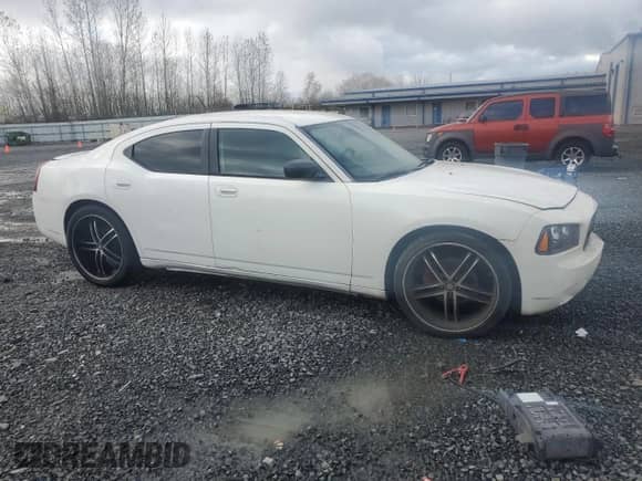 2008 Dodge Charger с VIN 2B3KA43RX8H199624, выставлен на аукционе Copart как лот 78526034 с пробегом 126 576 миль миль и Списание • Salvage title. История ставок и продаж доступна на DreamBid. Изображение 4.