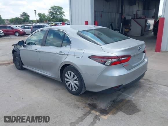 2021 Toyota Camry Hybrid LE z VIN 4T1C31AK2MU022229, wystawiony jako IAAI lot #42633309 z przebiegiem 37 463 mil mil oraz . Historia ofert i sprzedaży dostępna na DreamBid. Obrazek 3.