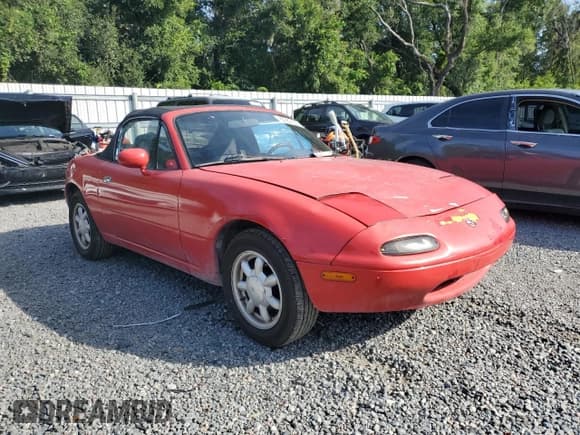 ✅ 1990 Mazda MX-5 Miata • VIN: JM1NA3510L0116566 • Lot: 67252145. Listed on Copart with 264,564 mi. Free auction sales archive from the USA and detailed vehicle history report at DreamBid. Image 4.