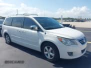 ✅ 2012 Volkswagen Routan • VIN: 2C4RVADG2CR120642 • Lot: 42354102. Listed on IAAI with 148,164 mi. Free auction sales archive from the USA and detailed vehicle history report at DreamBid. Image 1.