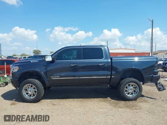 2019 Ram 1500 Limited z VIN 1C6SRFHT6KN921748, wystawiony jako IAAI lot #43169003 z przebiegiem 91 262 mil mil oraz . Historia ofert i sprzedaży dostępna na DreamBid. Obrazek 14.