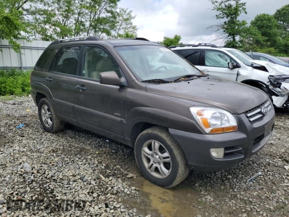 ✅ 2006 Kia Sportage LX • VIN: KNDJE723X67233079 • Lot: 56394225. Listed on Copart with 202,237 mi. Free auction sales archive from the USA and detailed vehicle history report at DreamBid. Image 4.
