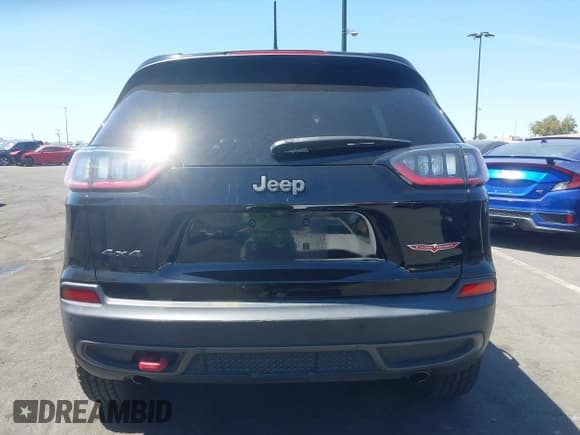 ✅ 2019 Jeep Cherokee Trailhawk • VIN: 1C4PJMBXXKD433284 • Lot: 42020051. Listed on IAAI with 57,089 mi. Free auction sales archive from the USA and detailed vehicle history report at DreamBid. Image 17.