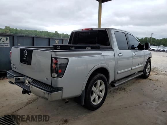 ✅ 2012 Nissan Titan SL • VIN: 1N6AA0ED4CN327602 • Lot: 67432415. Listed on Copart with 282,336 mi. Free auction sales archive from the USA and detailed vehicle history report at DreamBid. Image 3.