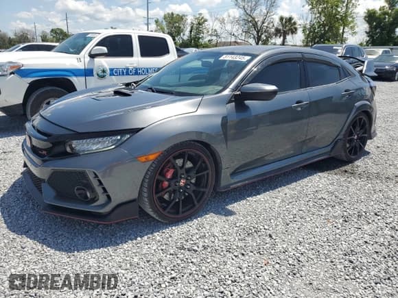 ✅ 2017 Honda Civic Type R Touring • VIN: SHHFK8G77HU200262 • Lot: 51143245. Wystawiony na Copart z przebiegiem 56 413 mil. Bezpłatny archiwum sprzedaży aukcyjnych z USA i szczegółowy raport historii pojazdu na DreamBid. Zdjęcie 1.