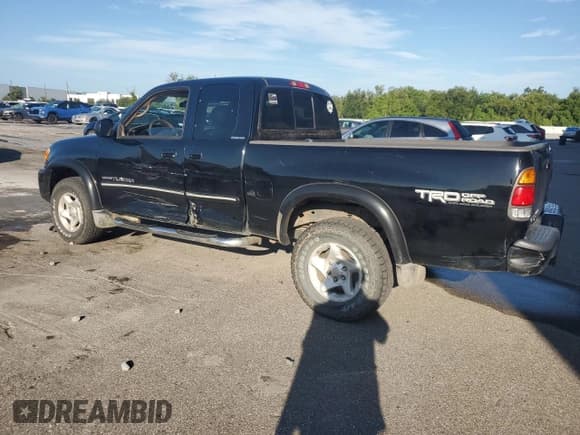 ✅ 2003 Toyota Tundra Limited • VIN: 5TBBT48103S419982 • Lot: 69567685. Wystawiony na Copart z przebiegiem 151 442 mil. Bezpłatny archiwum sprzedaży aukcyjnych z USA i szczegółowy raport historii pojazdu na DreamBid. Zdjęcie 2.