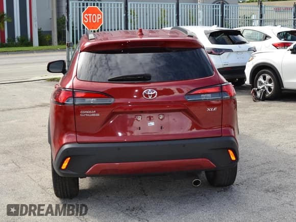 ✅ 2023 Toyota Corolla Cross XLE • VIN: 7MUDAAAG3PV055118 • Лот: 86477925. Опубликован ранее на Copart с пробегом 19 380 миль. Бесплатный доступ к архиву аукционных продаж из США и подробный отчёт об истории автомобиля на DreamBid. Изображение 7.