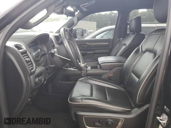2021 Ram 1500 Limited with VIN 1C6SRFHT7MN746302, listed as a Copart auction lot 68719875 with 66,569 mi miles and Salvage title. Bid and sale history available at DreamBid. Image 7.