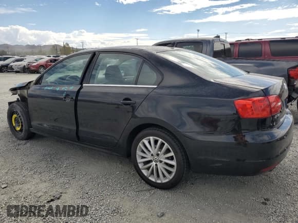 ✅ 2013 Volkswagen Jetta SEL • VIN: 3VWLX7AJ2DM390303 • Lot: 82393335. Listed on Copart with 52,446 mi. Free auction sales archive from the USA and detailed vehicle history report at DreamBid. Image 2.