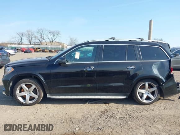 ✅ 2015 Mercedes-Benz GL 550 • VIN: 4JGDF7DE9FA444720 • Лот: 41771084. Опубликован ранее на IAAI с пробегом Не указан. Бесплатный доступ к архиву аукционных продаж из США и подробный отчёт об истории автомобиля на DreamBid. Изображение 13.