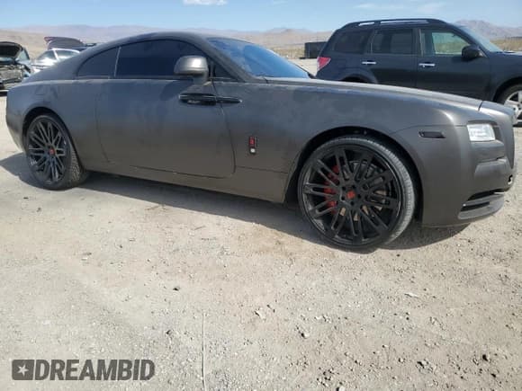 ✅ 2014 Rolls-Royce Wraith • VIN: SCA665C57EUX84259 • Lot: 65586204. Wystawiony na Copart z przebiegiem 52 048 mil. Bezpłatny archiwum sprzedaży aukcyjnych z USA i szczegółowy raport historii pojazdu na DreamBid. Zdjęcie 4.