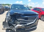 ✅ 2016 Mazda CX-9 Grand Touring • VIN: JM3TCADY3G0109113 • Lot: 42673583. Wystawiony na IAAI z przebiegiem 122 463 mil. Bezpłatny archiwum sprzedaży aukcyjnych z USA i szczegółowy raport historii pojazdu na DreamBid. Zdjęcie 12.