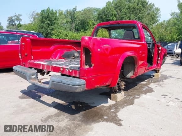✅ 2004 Dodge Dakota • VIN: 1D7FL16K54S567899 • Lot: 42939145. Listed on IAAI with Not provided. Free auction sales archive from the USA and detailed vehicle history report at DreamBid. Image 4.