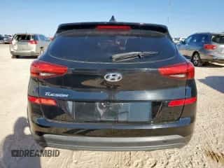2019 Hyundai Tucson SE z VIN KM8J23A45KU865037, wystawiony jako Copart lot #91181875 z przebiegiem 81 474 mil mil oraz Czysty tytuł • Clean title. Historia ofert i sprzedaży dostępna na DreamBid. Obrazek 6.