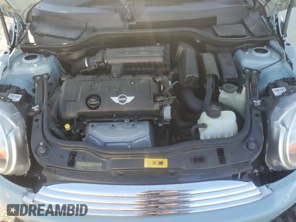 ✅ 2013 MINI Hardtop • VIN: WMWSU3C55DT689959 • Лот: 93443645. Опубликован ранее на Copart с пробегом 86 934 миль. Бесплатный доступ к архиву аукционных продаж из США и подробный отчёт об истории автомобиля на DreamBid. Изображение 11.