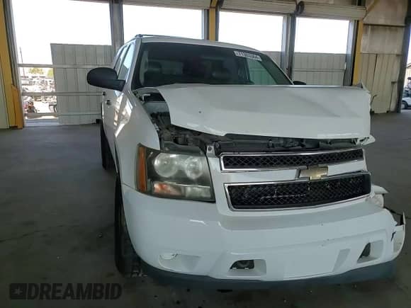 2011 Chevrolet Tahoe Commercial with VIN 1GNSK2E07BR200161, listed as a Copart auction lot 71303364 with 124,385 mi miles and Salvage title. Bid and sale history available at DreamBid. Image 12.