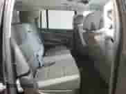 2018 Chevrolet Suburban LS z VIN 1GNSKGEC9JR393340, wystawiony jako Copart lot #56316665 z przebiegiem 104 751 mil mil oraz Szkoda całkowita • Salvage title. Historia ofert i sprzedaży dostępna na DreamBid. Obrazek 11.