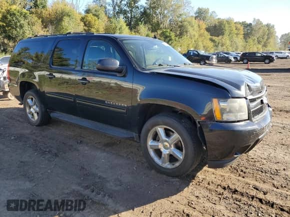 2011 Chevrolet Suburban LS with VIN 1GNSKHE34BR180335, listed as a Copart auction lot 82379145 with 259,352 mi miles and Clean title. Bid and sale history available at DreamBid. Image 4.