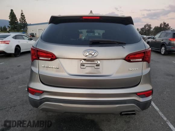 ✅ 2018 Hyundai Santa Fe 2.4L • VIN: 5NMZU3LB0JH056211 • Lot: 93690255. Listed on Copart with 75,202 mi. Free auction sales archive from the USA and detailed vehicle history report at DreamBid. Image 6.
