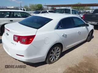 2014 Chevrolet Malibu LTZ z VIN 1G11H5SL6EF294731, wystawiony jako IAAI lot #43455733 z przebiegiem 145 159 mil mil oraz . Historia ofert i sprzedaży dostępna na DreamBid. Obrazek 4.