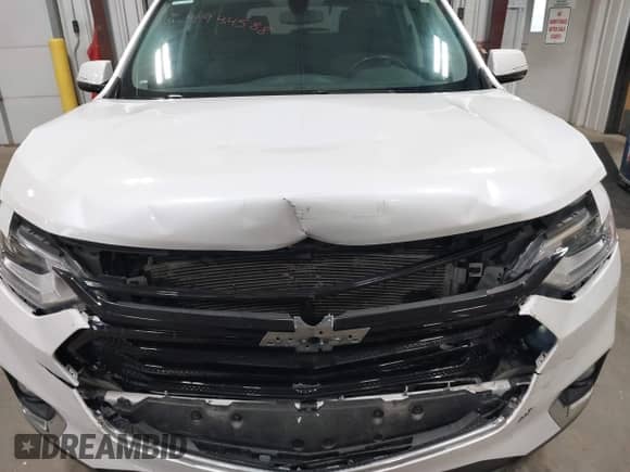 2019 Chevrolet Traverse LT Cloth z VIN 1GNEVGKW1KJ298306, wystawiony jako IAAI lot #43302460 z przebiegiem 76 785 mil mil oraz . Historia ofert i sprzedaży dostępna na DreamBid. Obrazek 12.